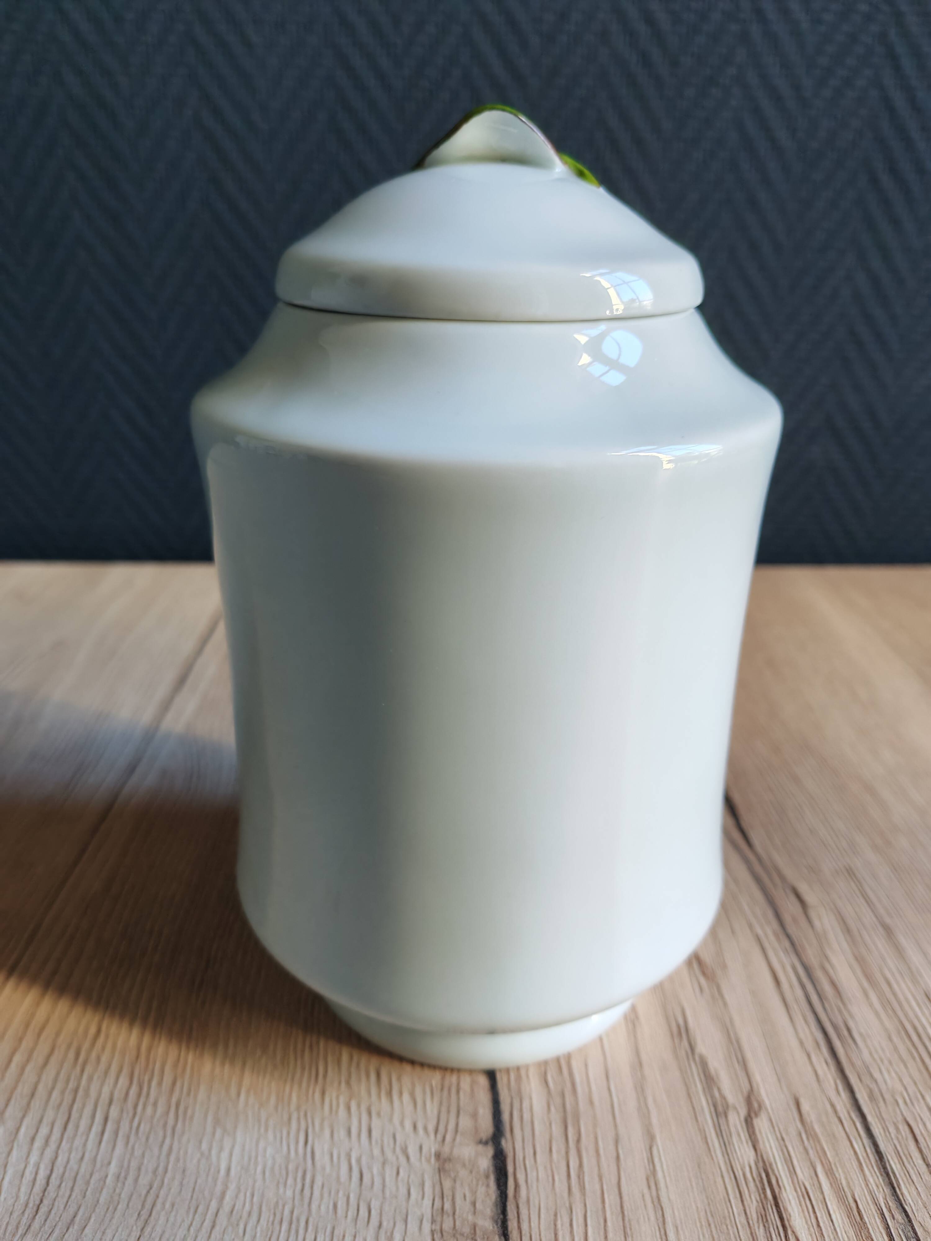 Porcelain jam pot with hand-painted plum design, signed sweet jar.