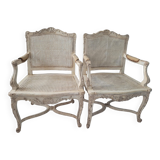 Pair of regency armchairs; canes; white lacquered 19th century