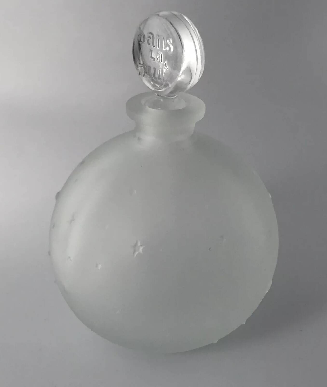 Lalique bottle in the night, frosted glass, ball shape