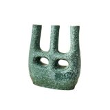 Artisanal vase in black and blue.