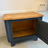 Mat black storage furniture, natural top.