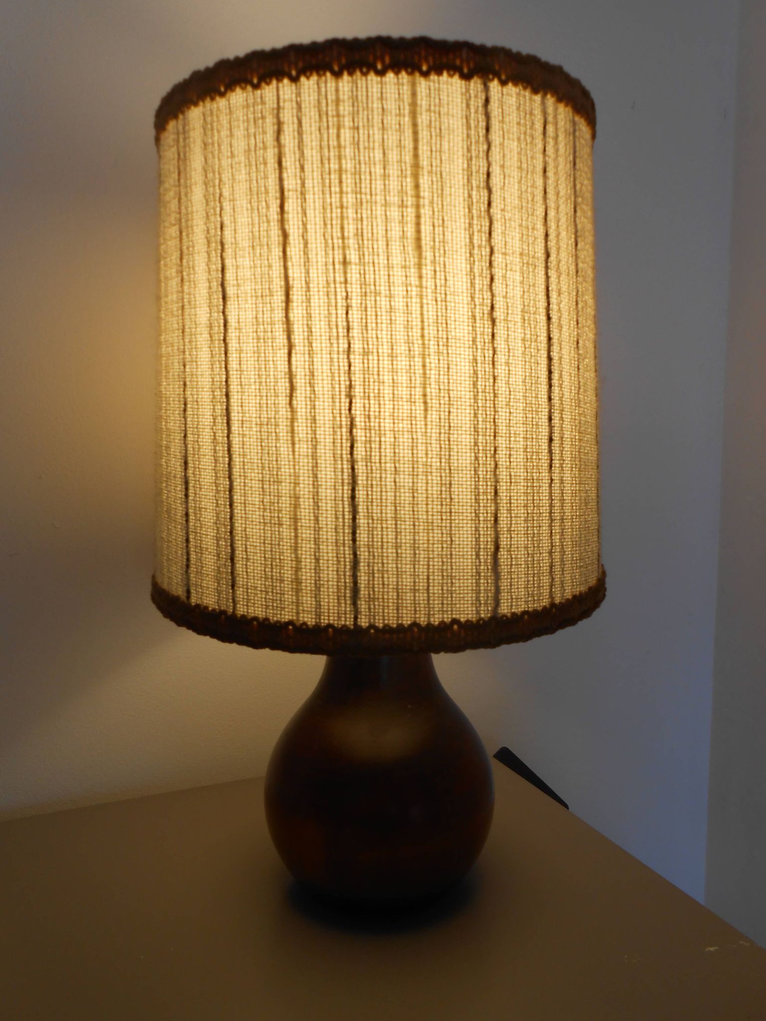 Carved wood lamp and wool yarn lampshade