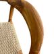 Set of 4 solid wood chairs with cord and armrests.