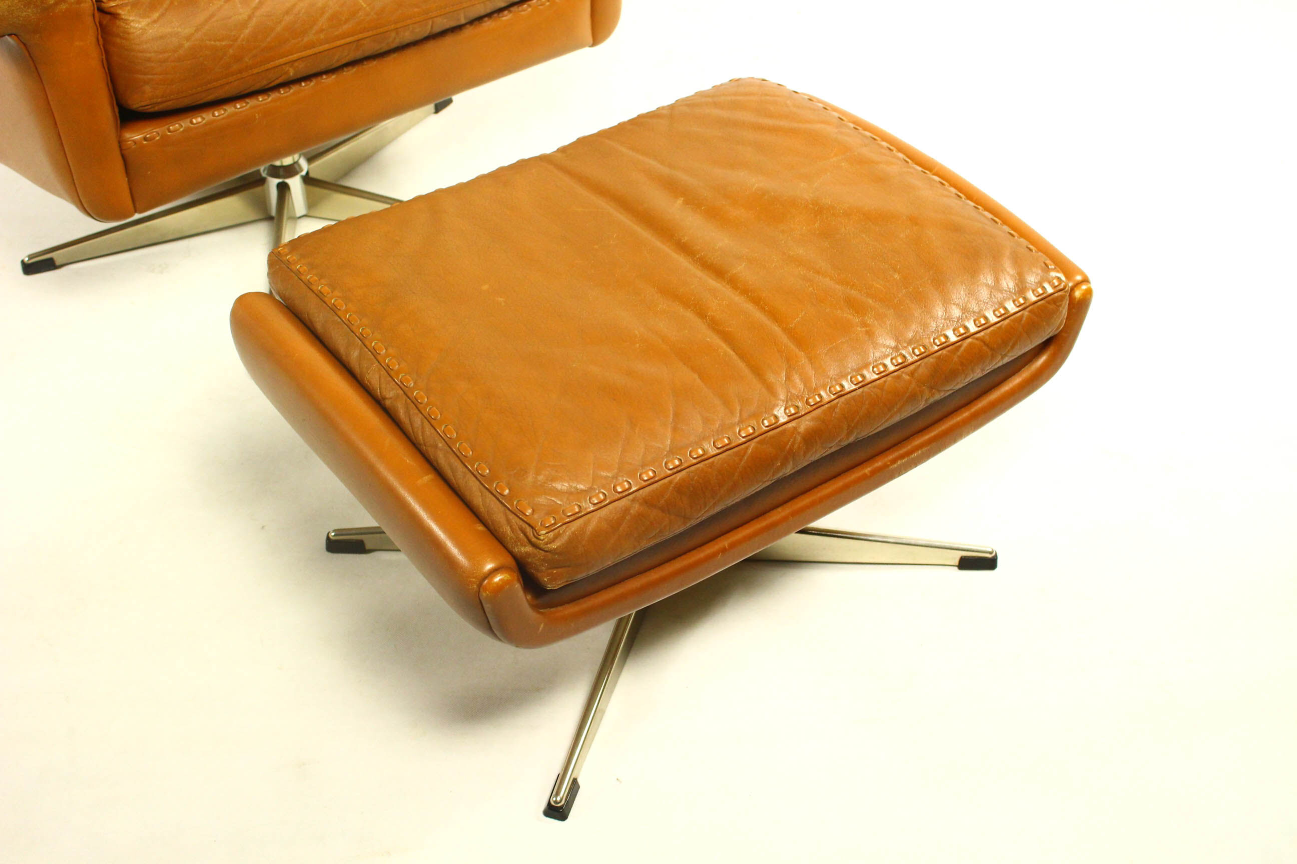 Matador swivel leather chair with ottoman by Aage Christiansen for Erhardsen & Andersen, 1960s