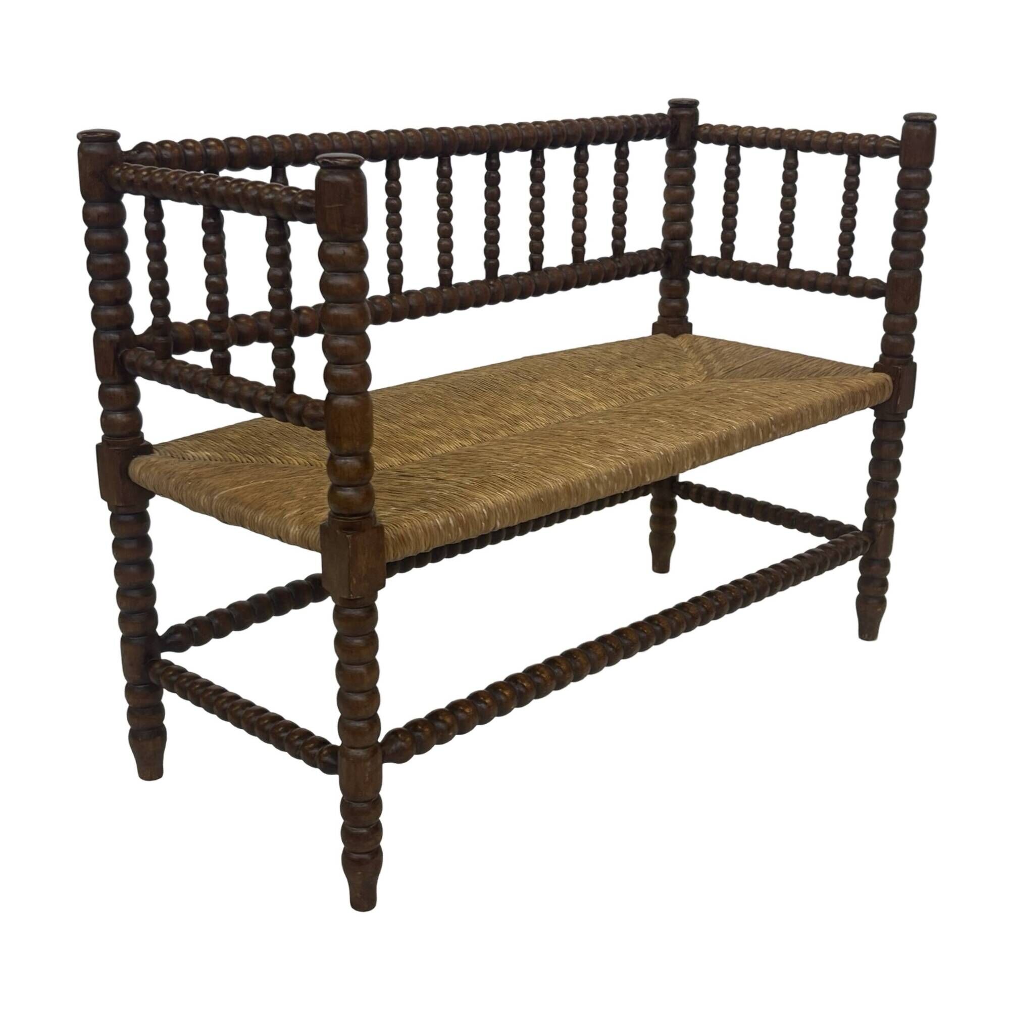 Vintage 'bobbin' bench with a rush seat, 1920s design with armrests.