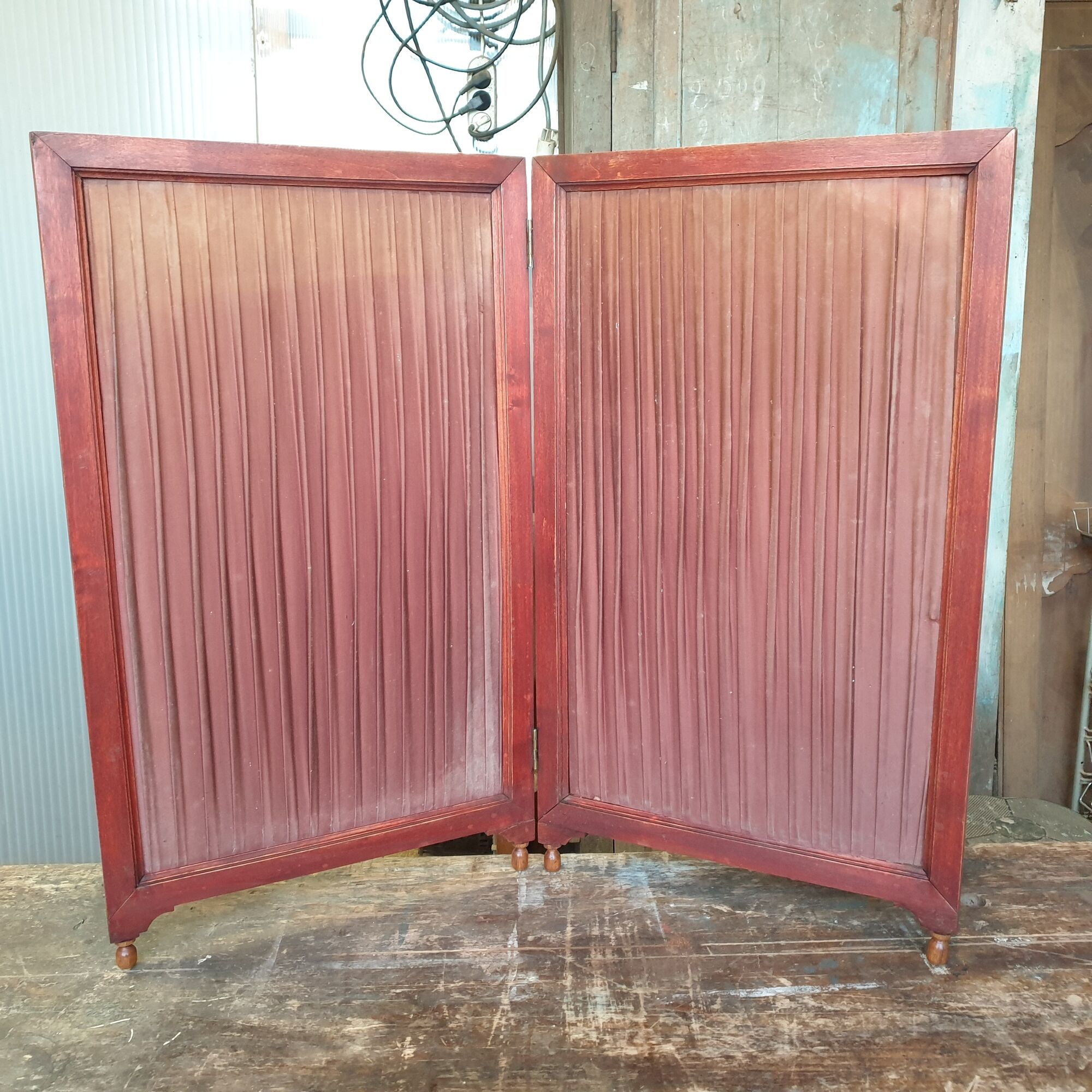 By fire art-nouveau in wood, embossed leather and fabric