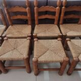 4 chairs and stools, brutalist art, straw and wood