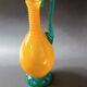 Vintage orange and green blown glass bottle, art glassware