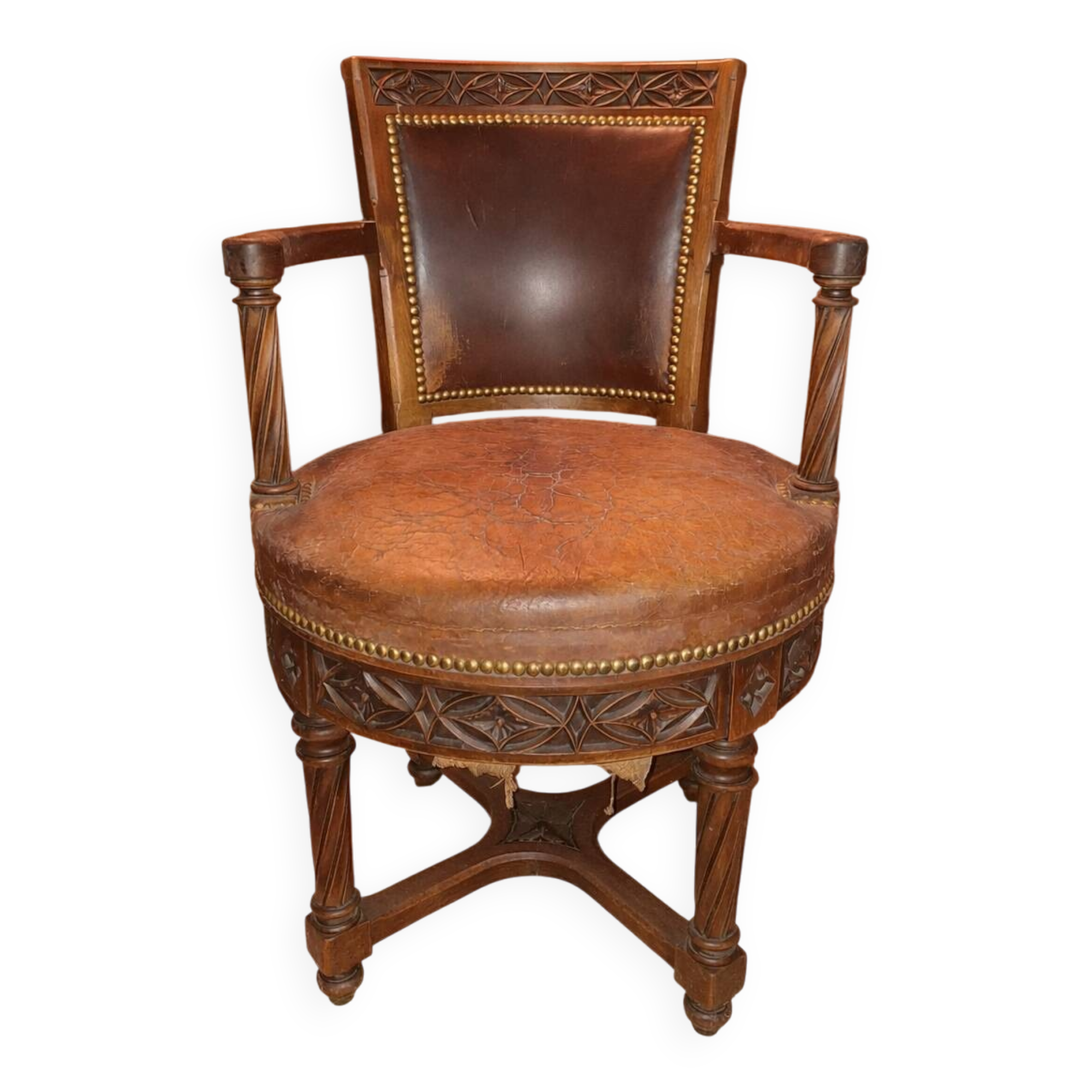 Antique swivel armchair in carved wood and patinated leather – neo-Renaissance style