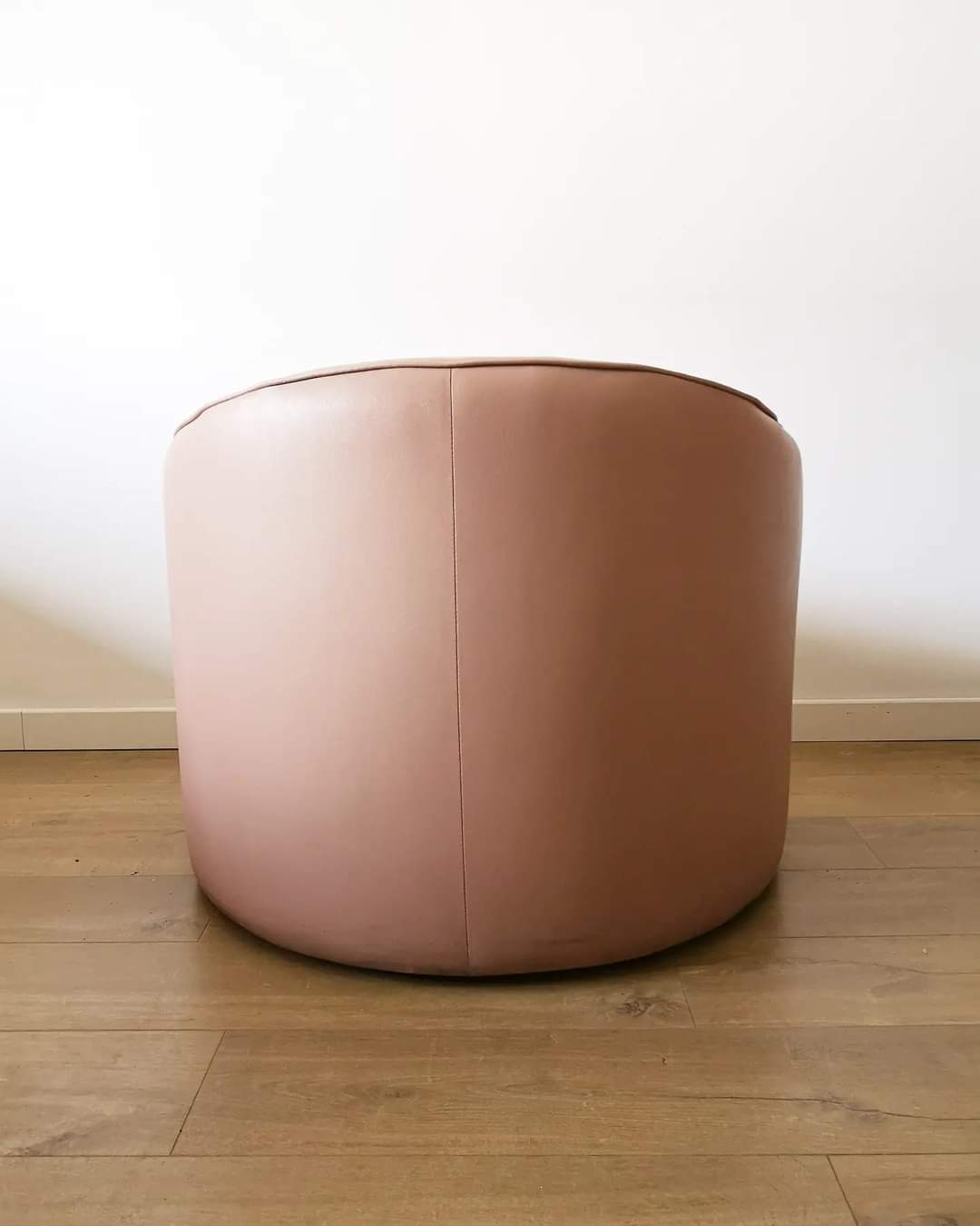 Pair of pink skai armchairs