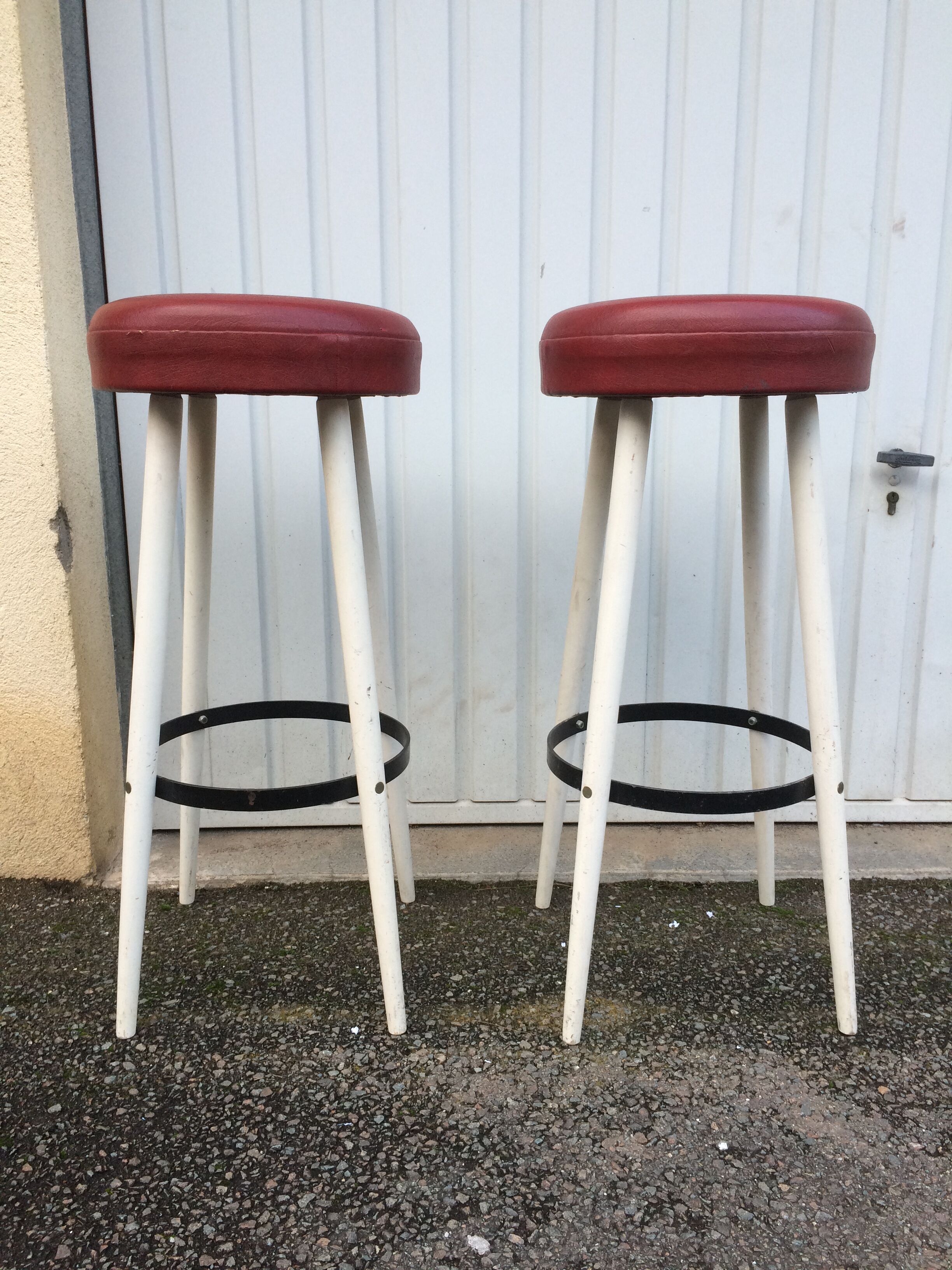 Pair of white and red 1950s bar stools