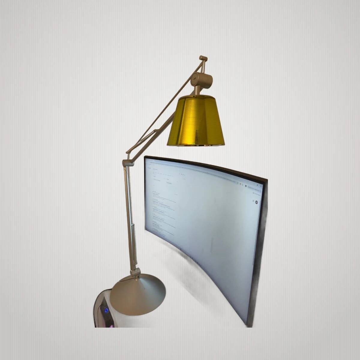 Philippe Starck Archimoon K lamp for Flos 1998 with yellow shade.