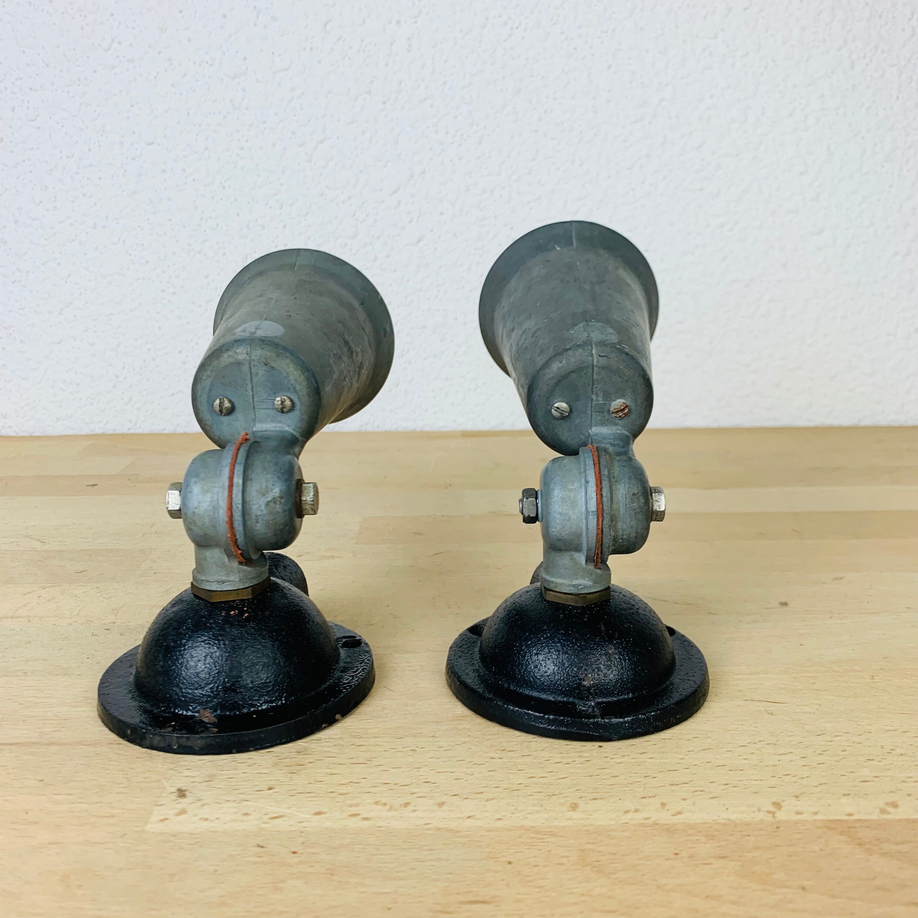 Pair of industrial metal spot wall lights in loft style.