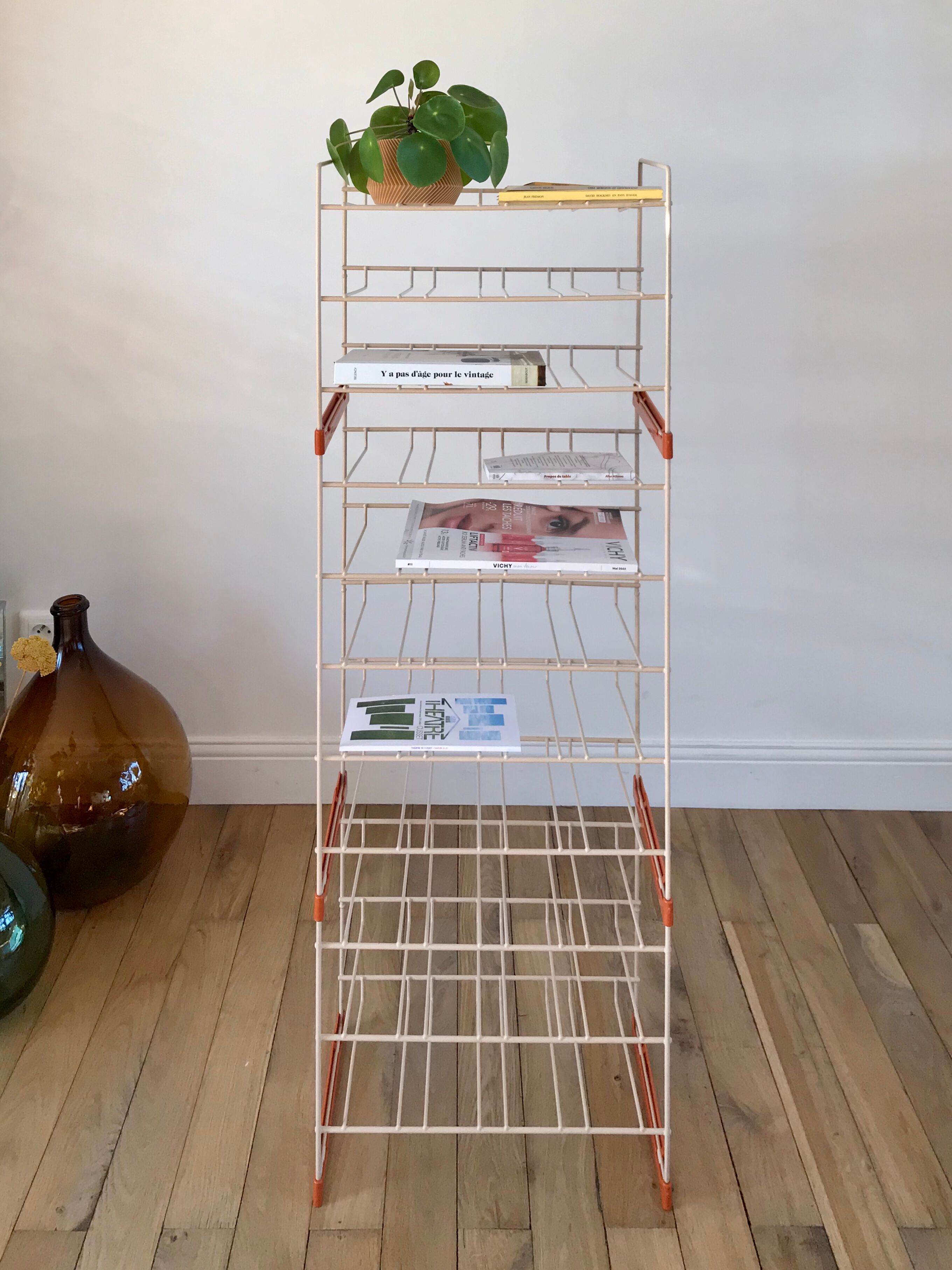 White and orange industrial shelf brand "caddie" 50s