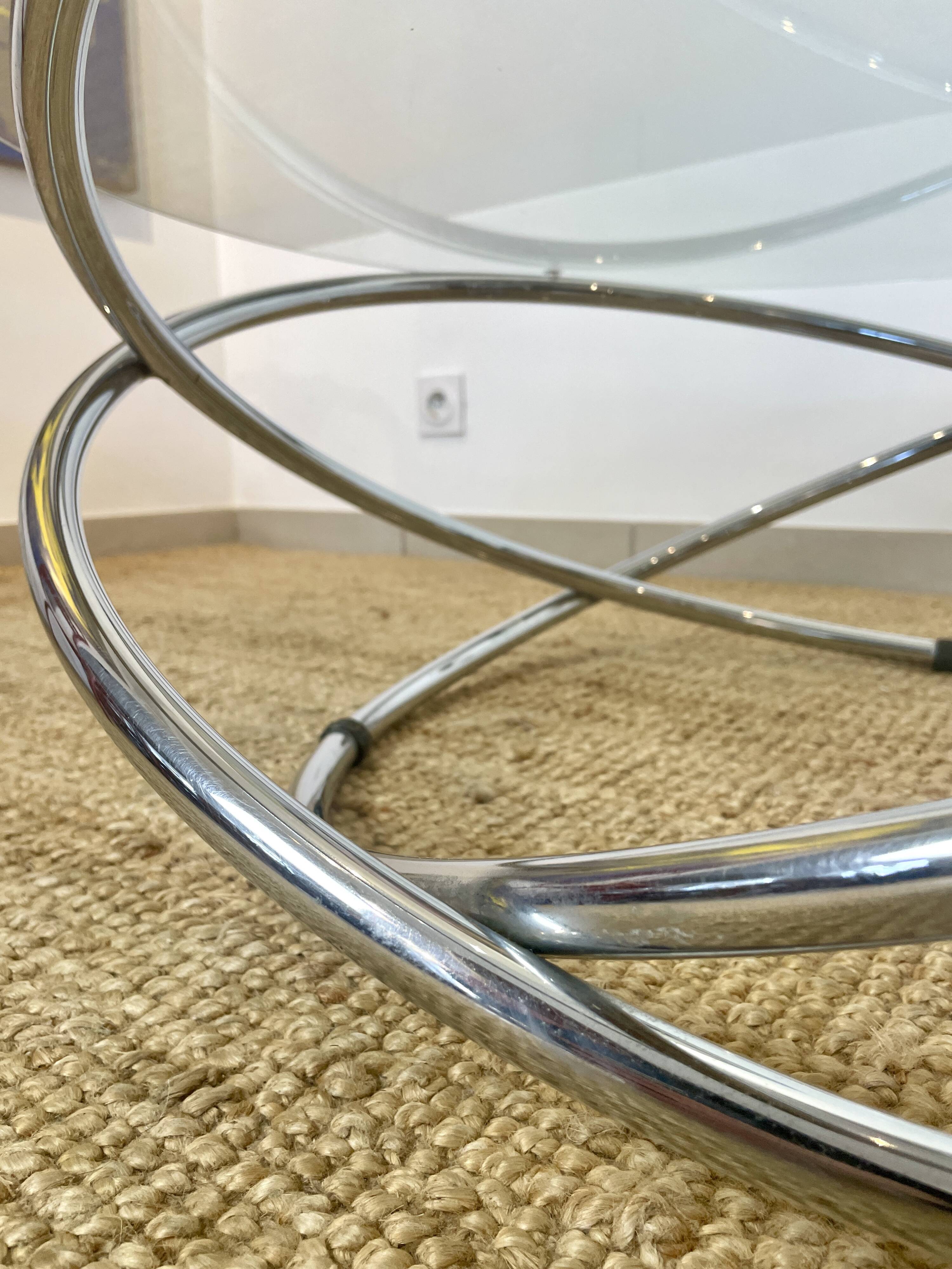 Coffee table with glass top and chrome tubular base