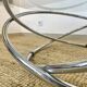 Coffee table with glass top and chrome tubular base