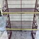 Old baker's grid, dating back to the early 20th century, made of wrought iron and brass
