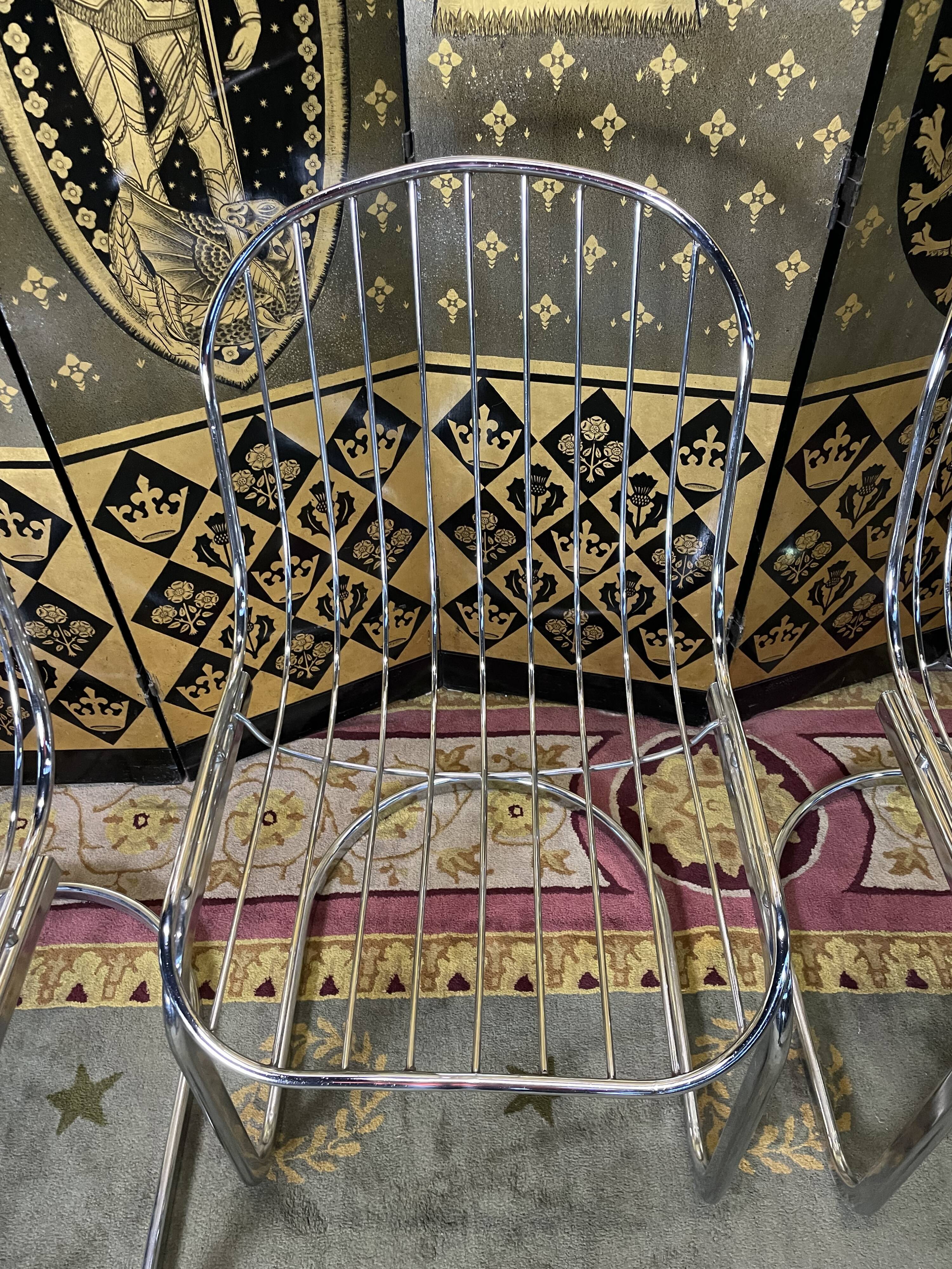 Suite of 4 chrome metal chairs 1970