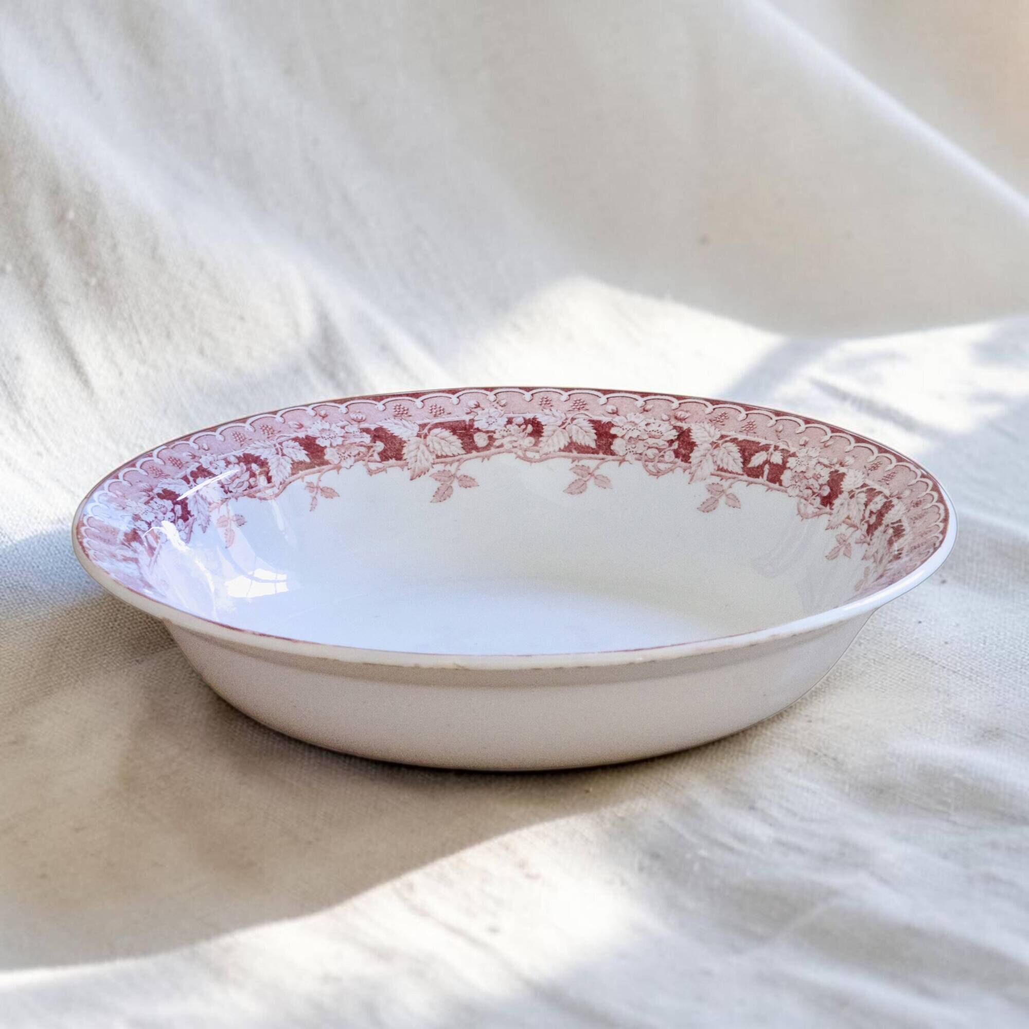 Pink ironstone salad bowl signed St Amand, Mûrier collection.