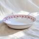 Pink ironstone salad bowl signed St Amand, Mûrier collection.