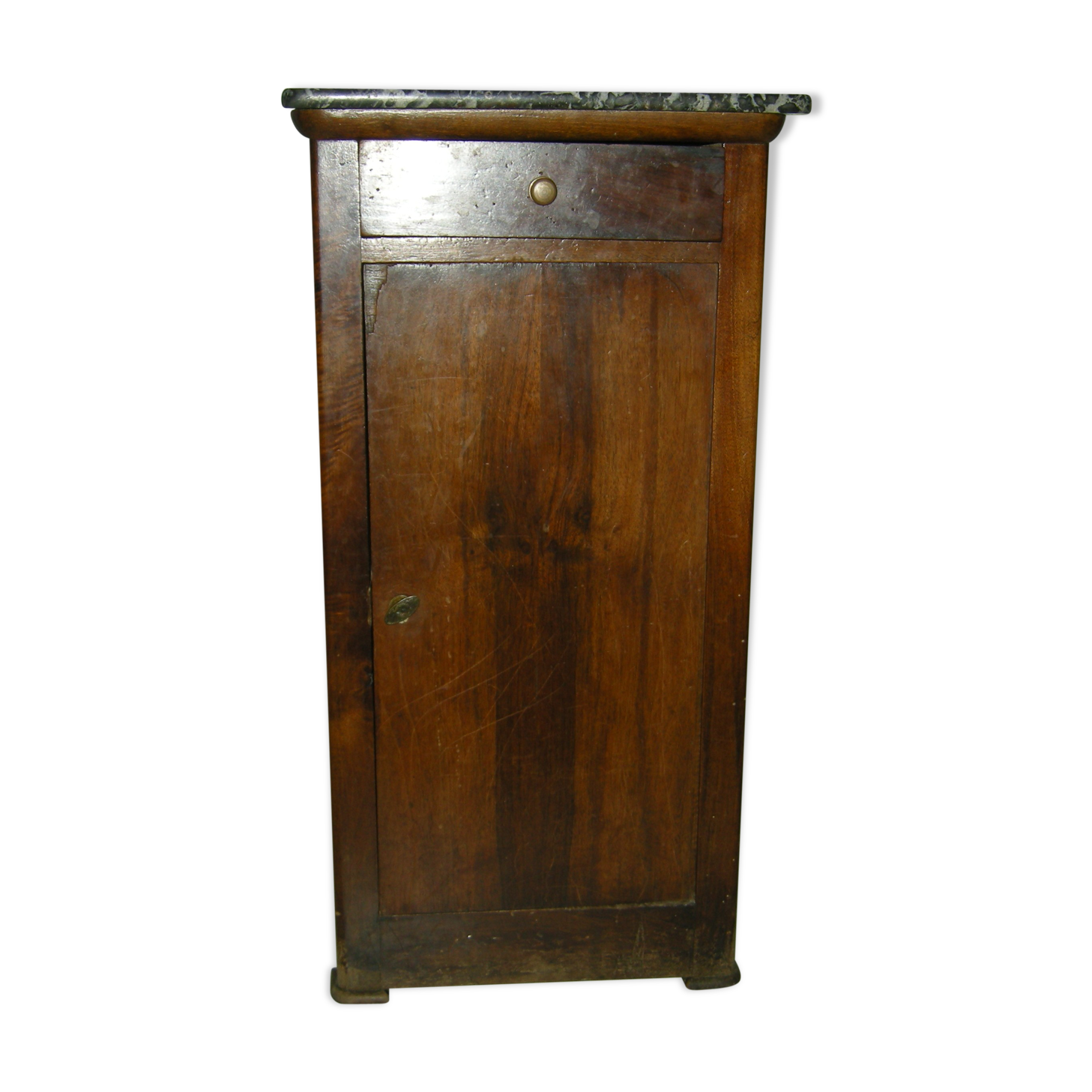 Walnut bedside table on marble