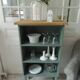 Small vintage bookcase enhanced in smoky green