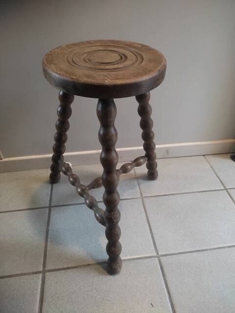 Solid wood stool with patinated varnished tripod legs