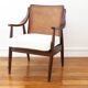 Fauteuil vintage en cannage - Restauré - Assise neuve