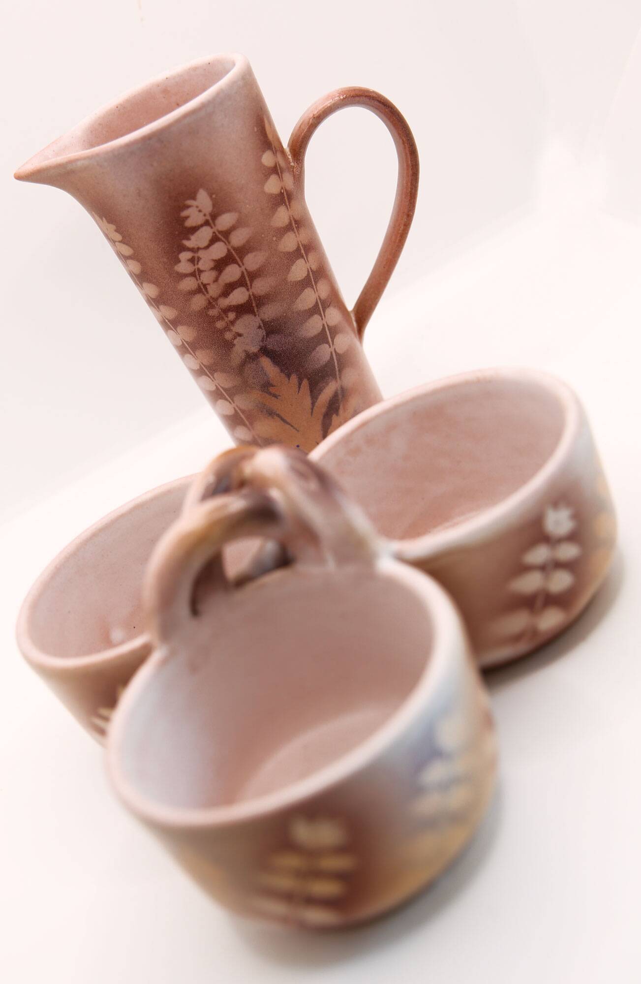 Lot of a pitcher and bowl with old pink flowers by Jean Austruy