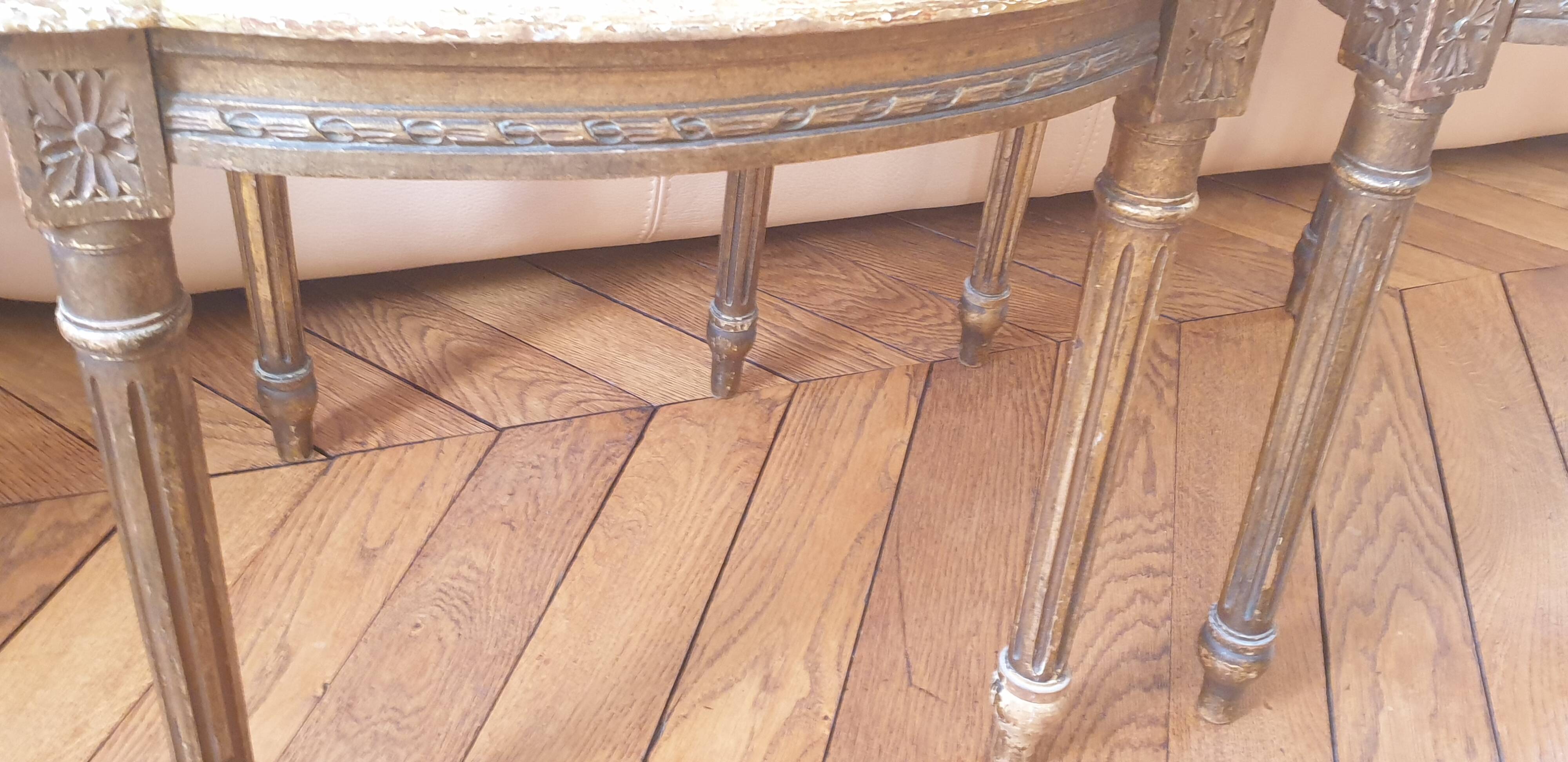 Pair of Louis XVI caned chairs with carved gilded wood.