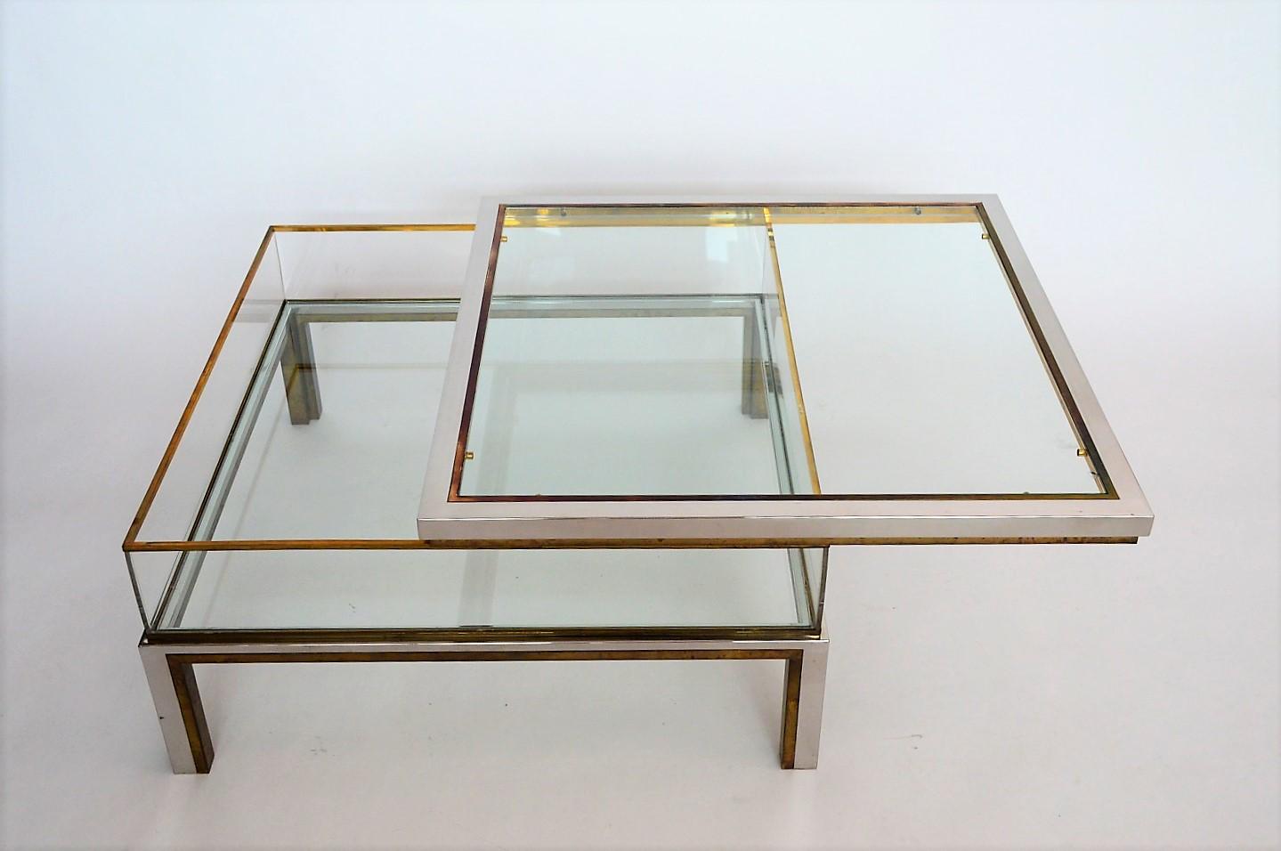 Coffee table in brass and chrome with folding top compartment to House Jansen 1970 s