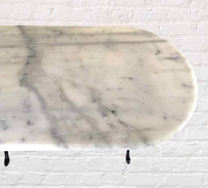 Oval marble and cast iron bistro table