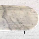 Oval marble and cast iron bistro table