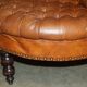 Heritage leather Chesterfield sofa, four-seater, Tête-à-Tête model.