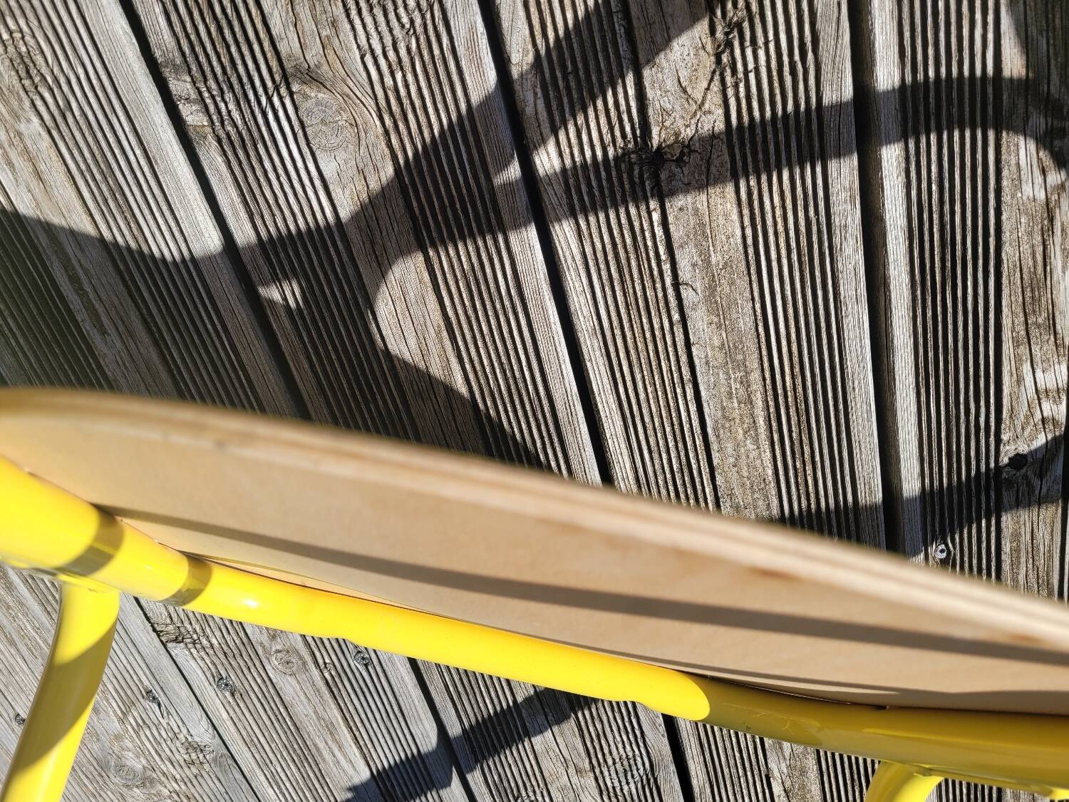 Pair of yellow plywood chairs