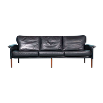 3-seater sofa in black leather from the mid-century vintage from the 60s