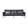 3-seater sofa in black leather from the mid-century vintage from the 60s