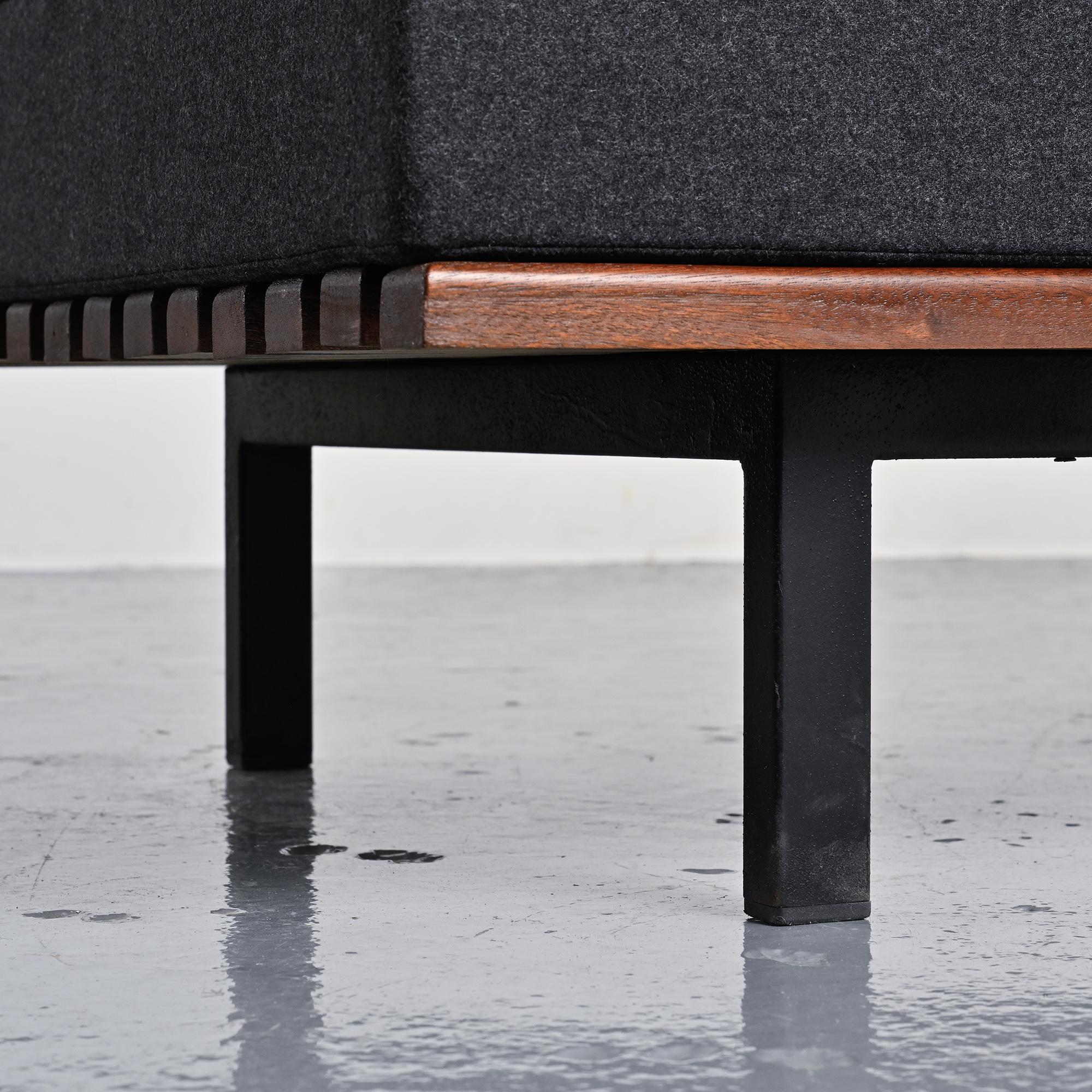 Cansado bench in mahogany by Charlotte Perriand, circa 1962.