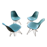 4 Eames chairs in turquoise blue color