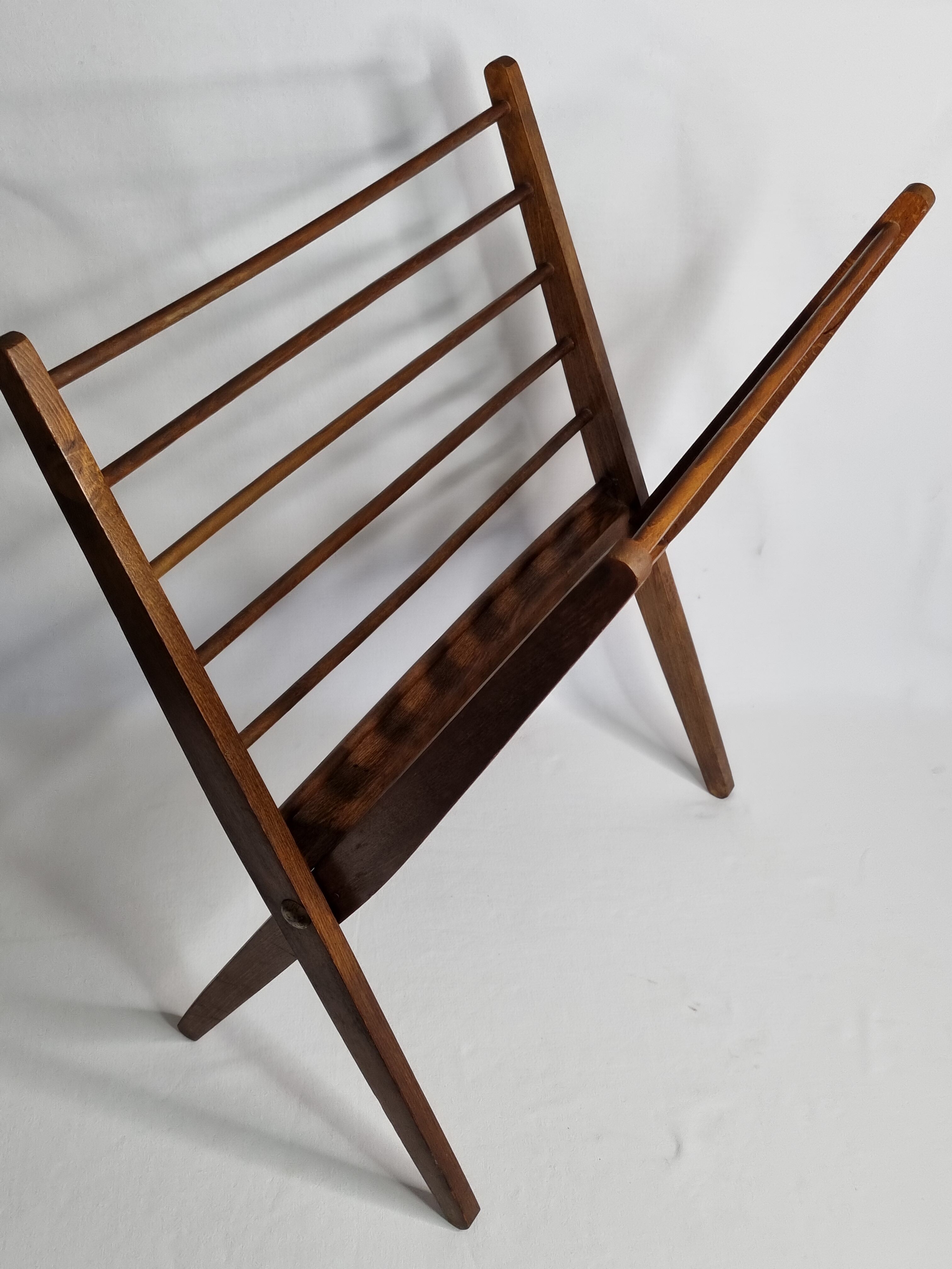 Folding teak magazine holder by Cees Braakman