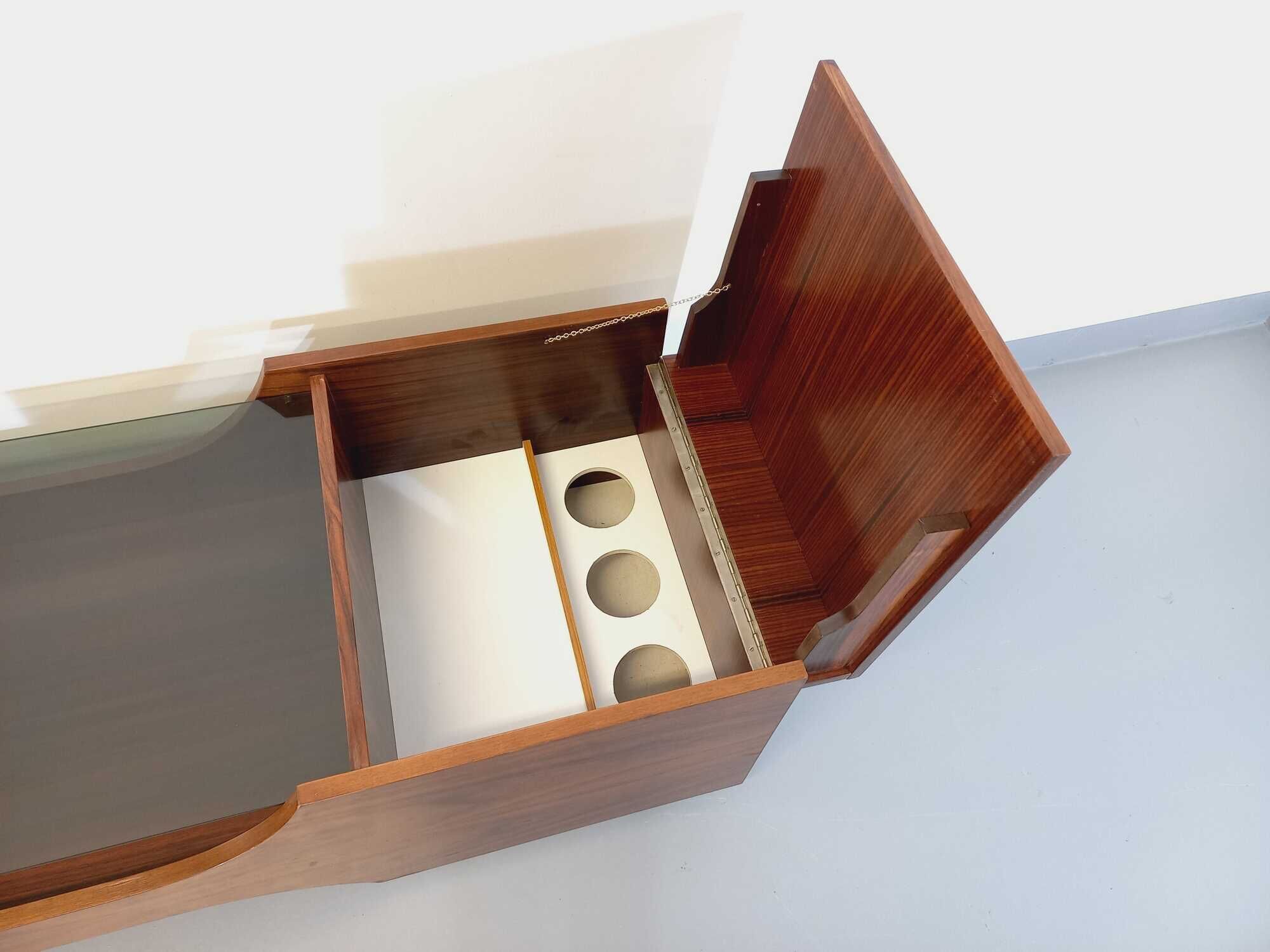 Vintage bar coffee table on rosewood wheels and smoked glass from the 60s