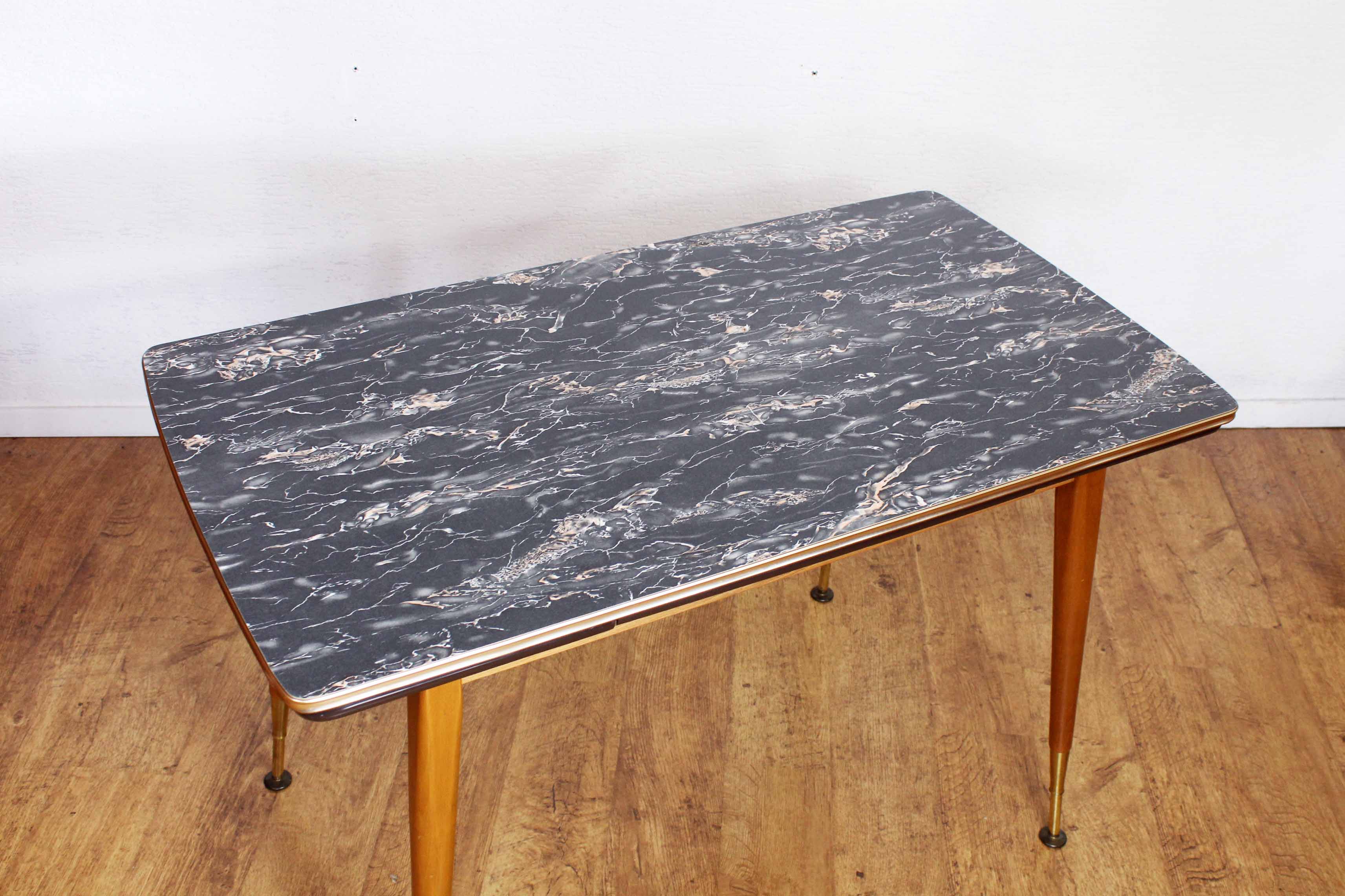 Table with compass feet from the 70s with "rise and fall" system