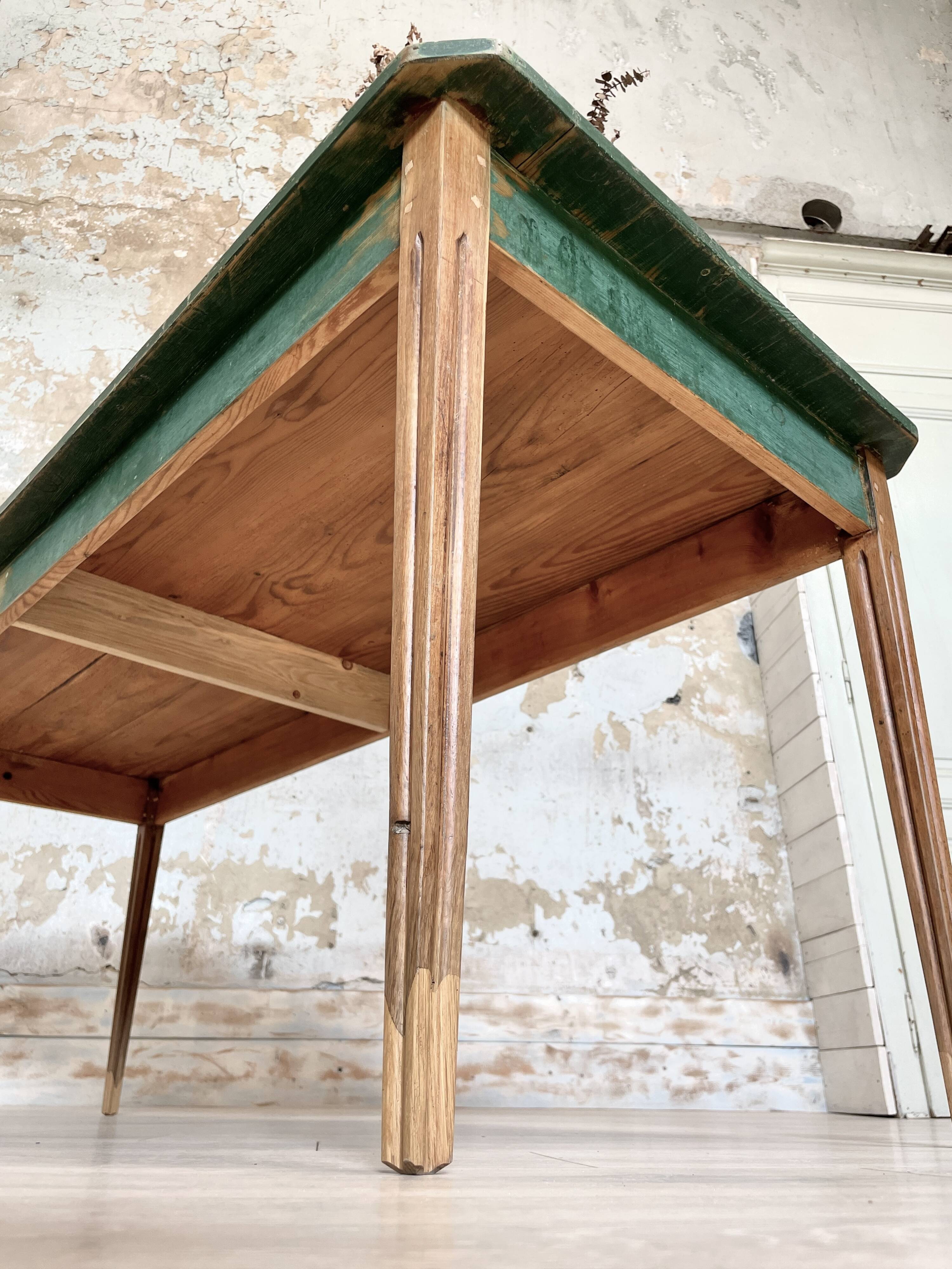 Vintage farm table with spindle legs.