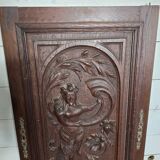 Ancienne porte en bois sculpté en chêne