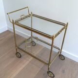 Neoclassical style rolling table in brass