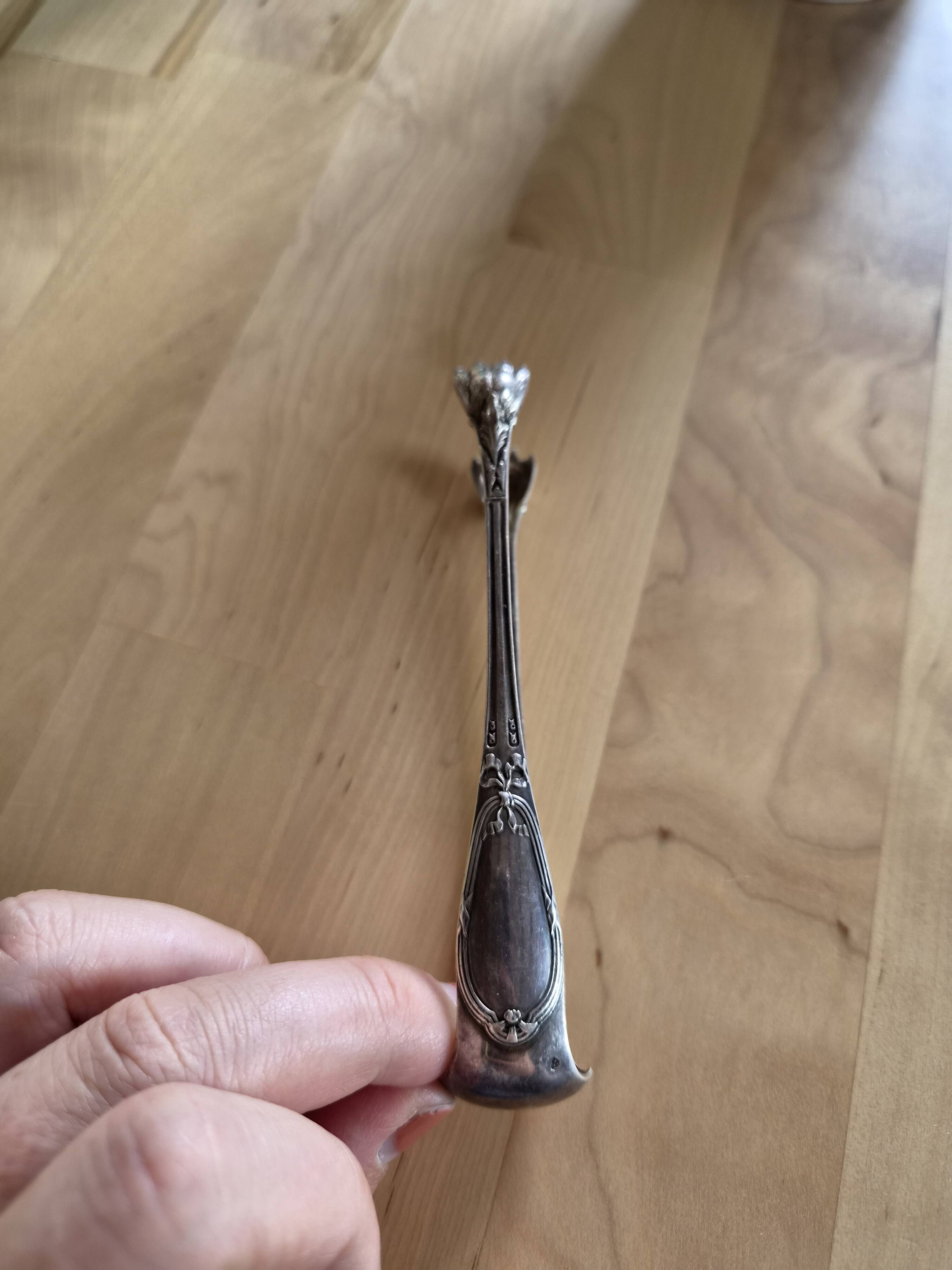 Sugar tongs from the Christofle Art Nouveau house.