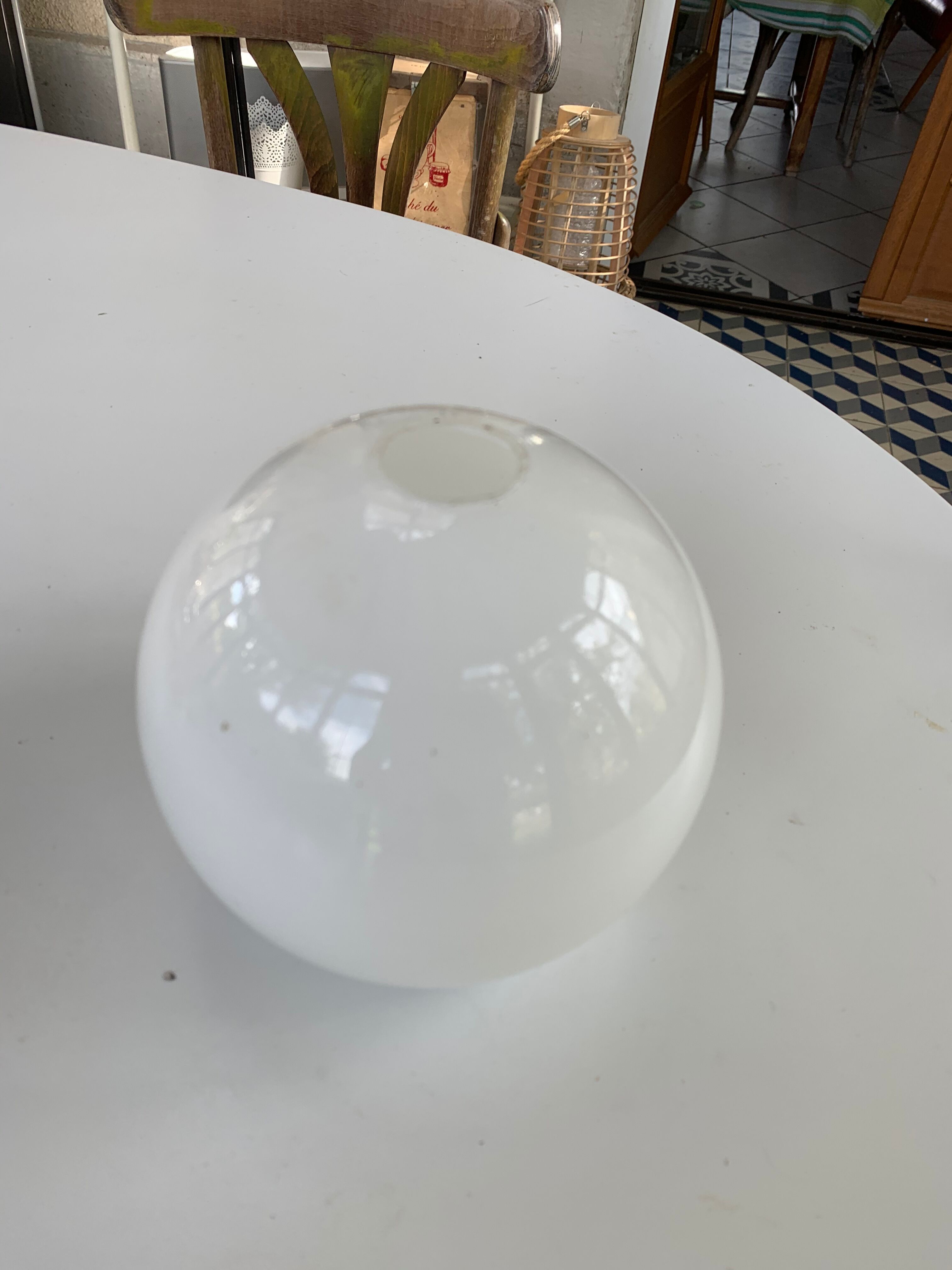 Globe ball in vintage white opaline