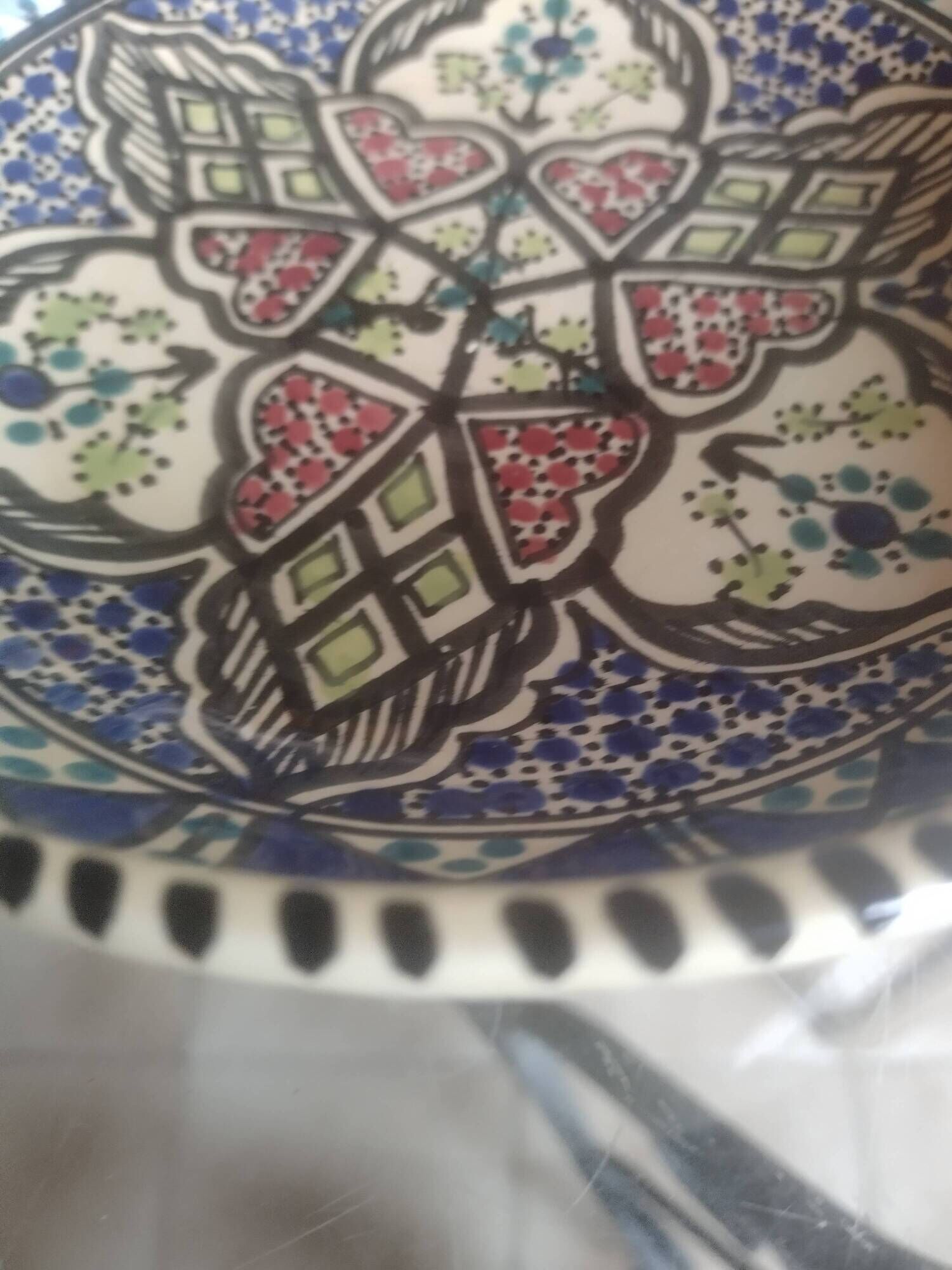 Antique Tunisian ceramic plate, signed and numbered.