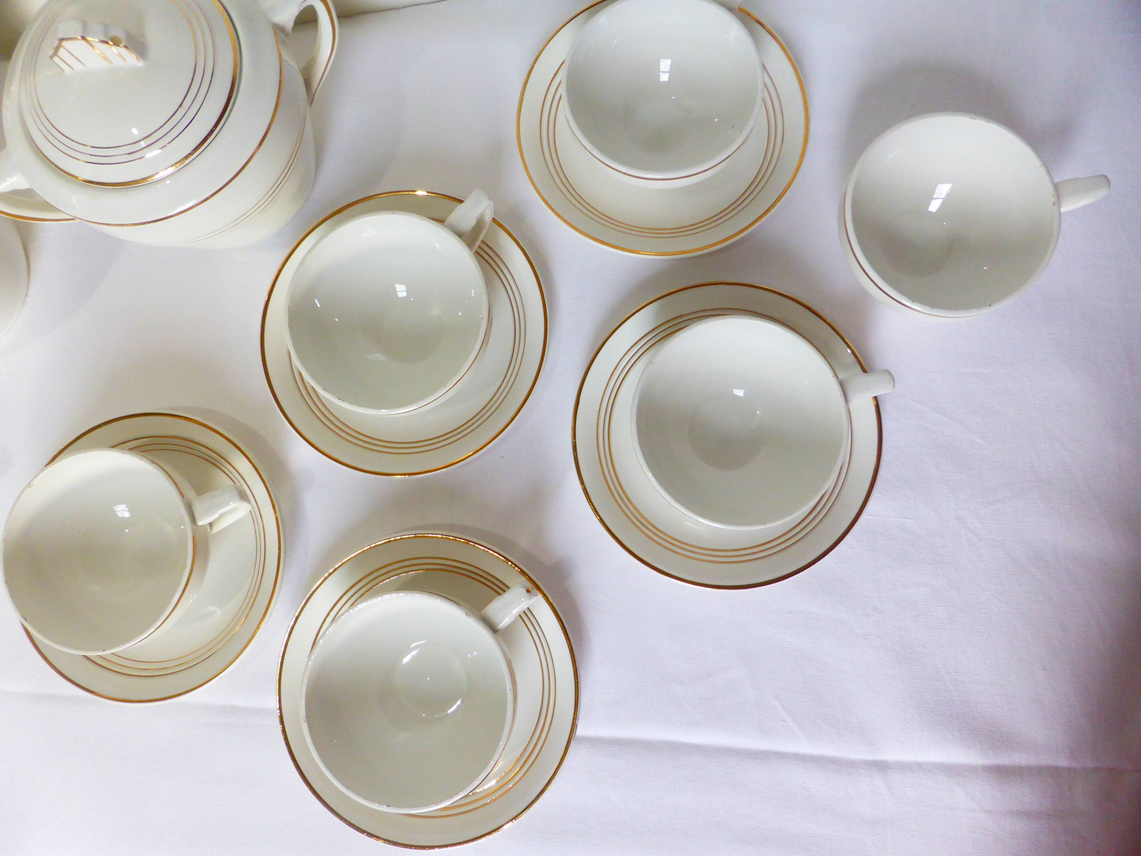 Céranord coffee service with gold trim 220574