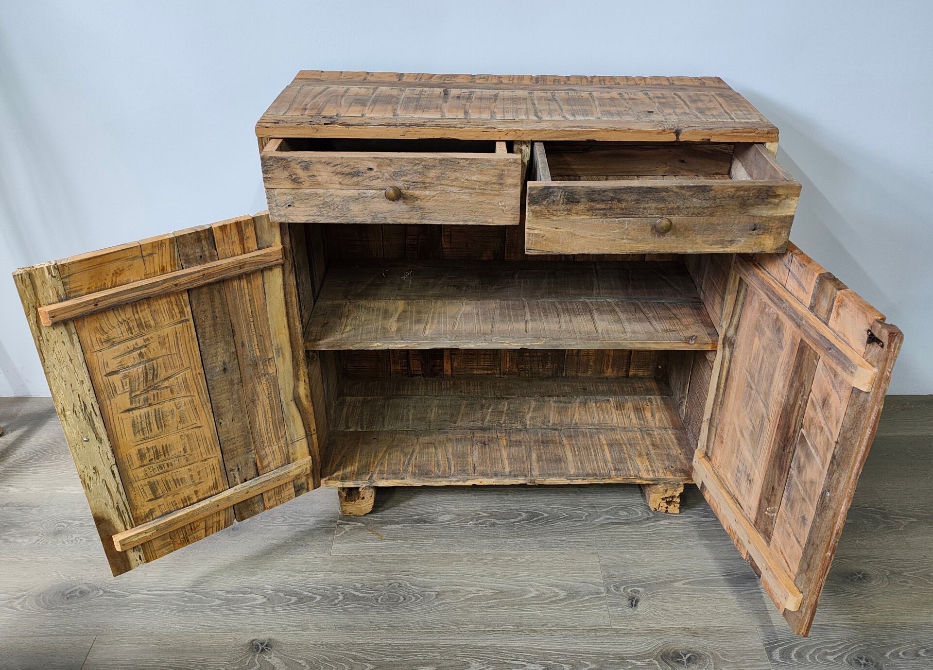 Two-door buffet with two drawers in antique wood.